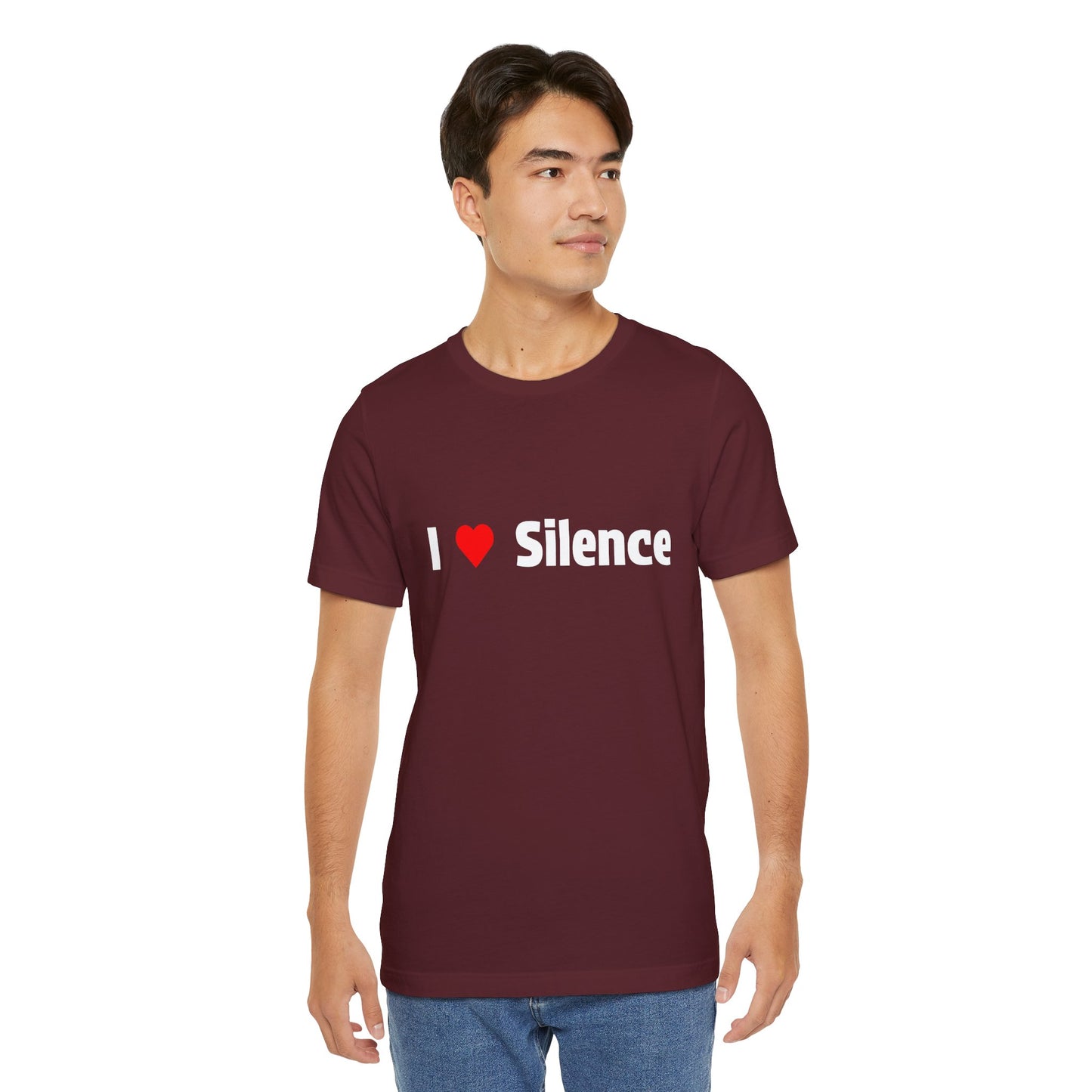 Man wearing a maroon t-shirt with text 'I Love Silence' in white letters.