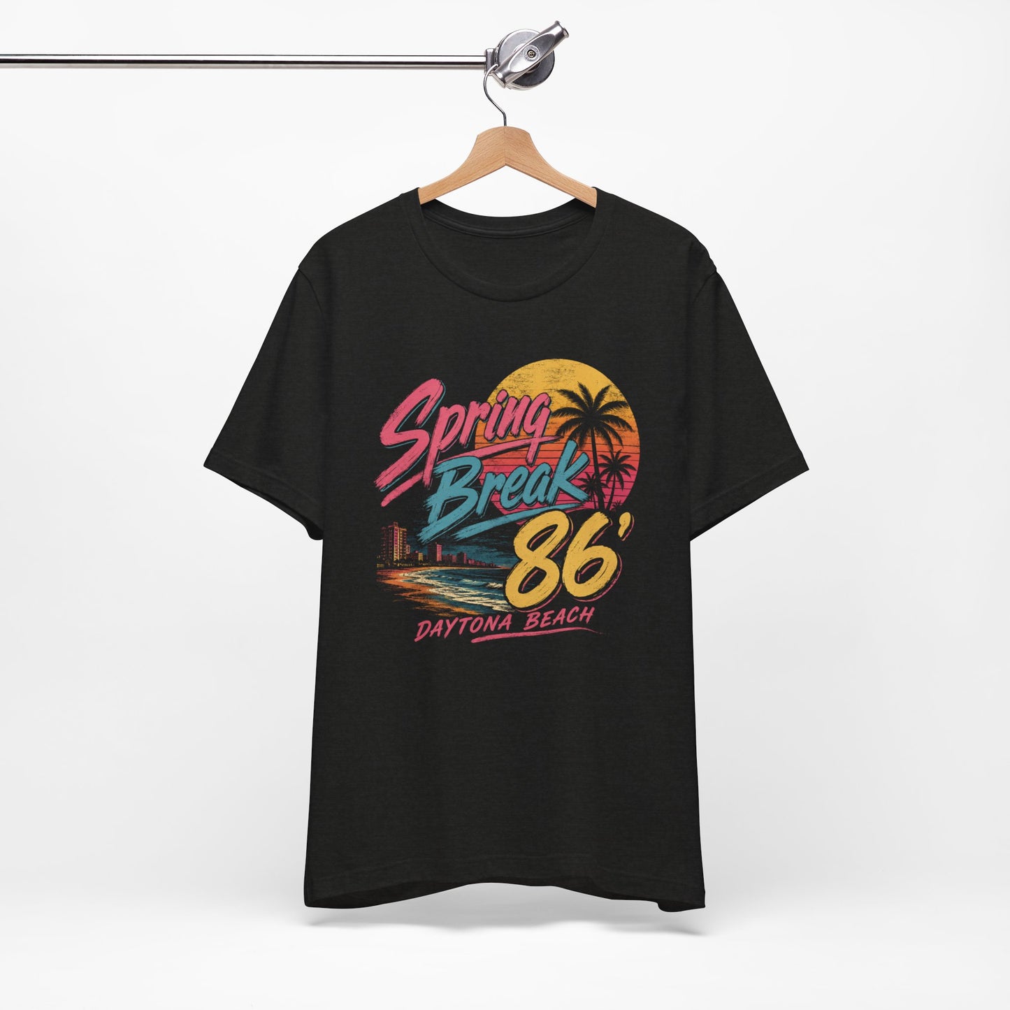 A black short-sleeve t-shirt featuring a colorful retro graphic on the front that reads 'Spring Break 86' and 'Daytona Beach'.