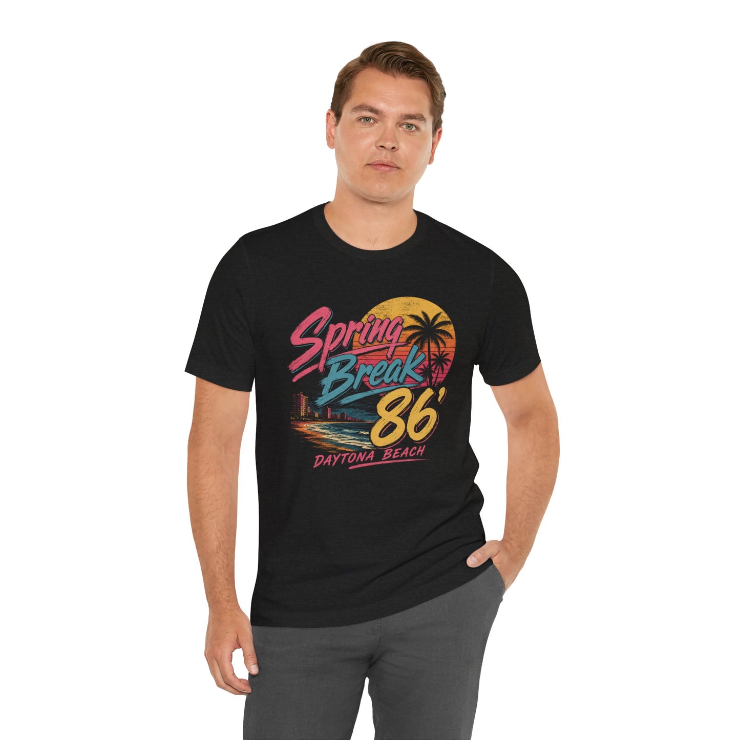 A man wearing a black short-sleeve graphic t-shirt with a colorful retro 'Spring Break 86 Daytona Beach' print.