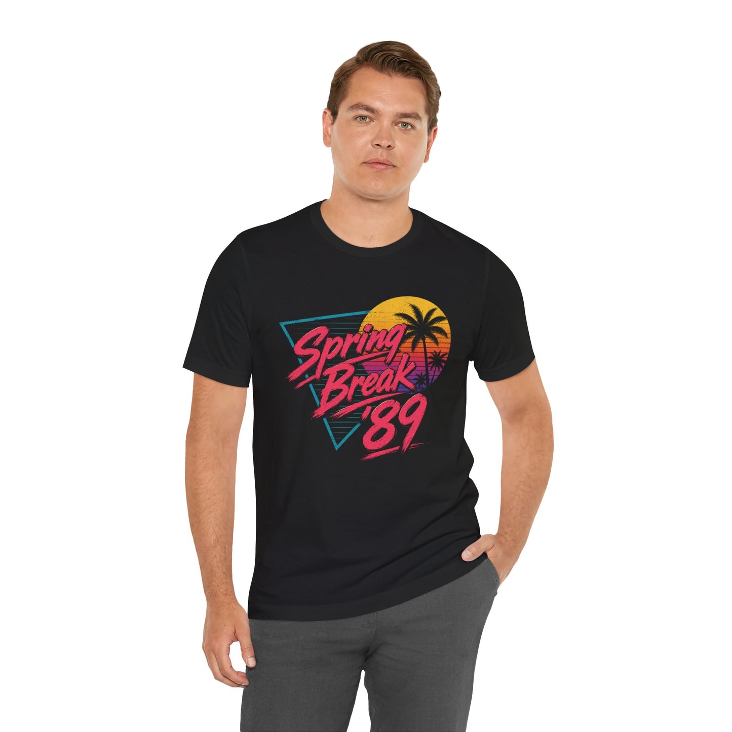 A man wearing a black short-sleeve t-shirt with a colorful retro 'Spring Break '89' graphic on the chest.