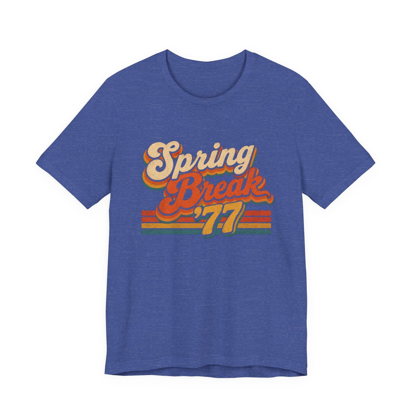 A heather blue short-sleeve t-shirt with a retro-style graphic on the chest reading 'Spring Break '77' in cream, orange, and yellow.