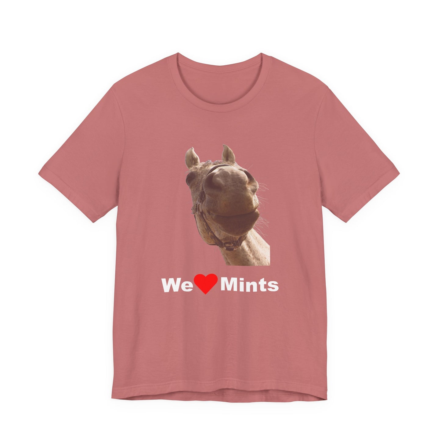 A heather pink short-sleeve t-shirt featuring a graphic of a horse's face above the text 'We Love Mints'.