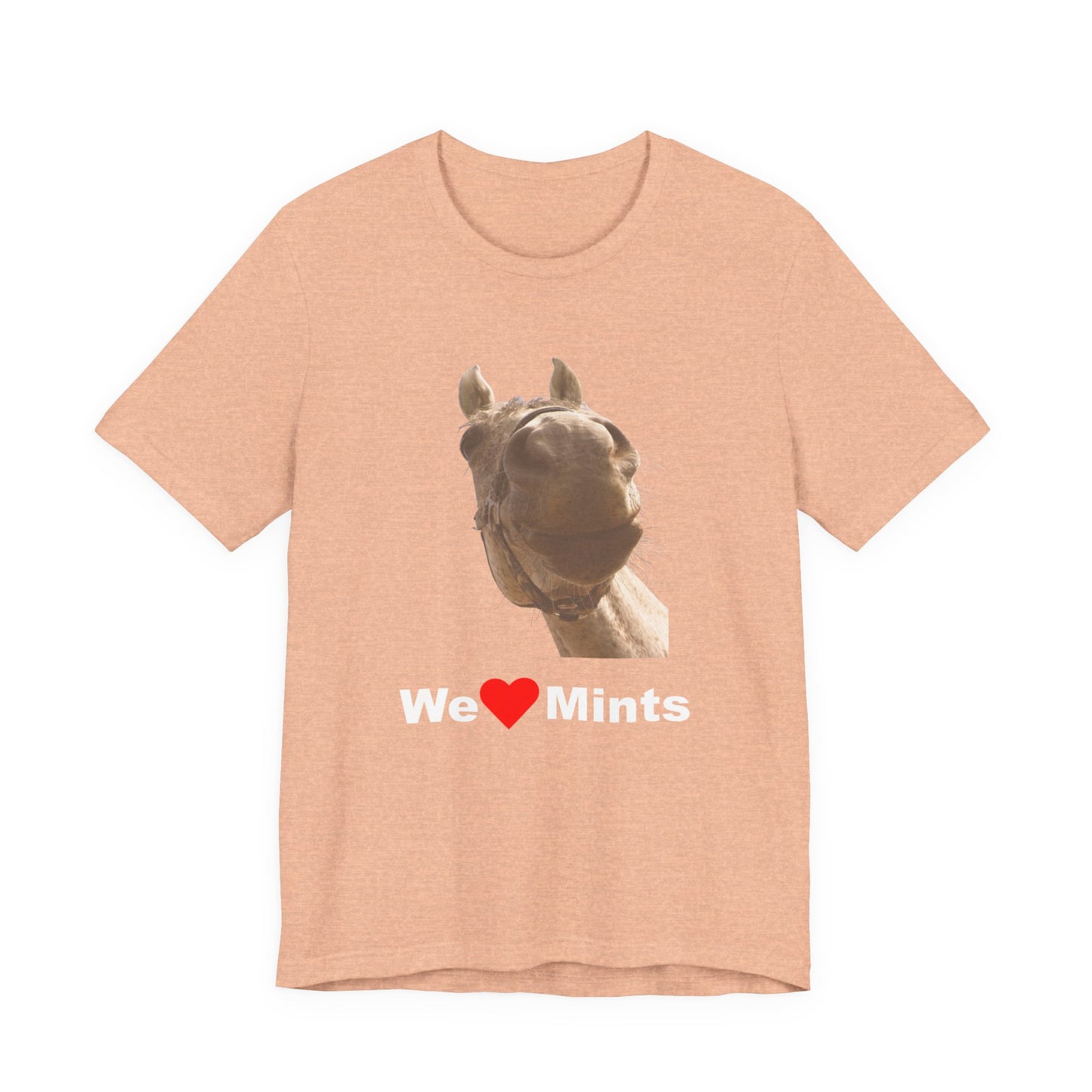 Peach short-sleeve t-shirt featuring a graphic of a horse's face above the text 'We Love Mints'.