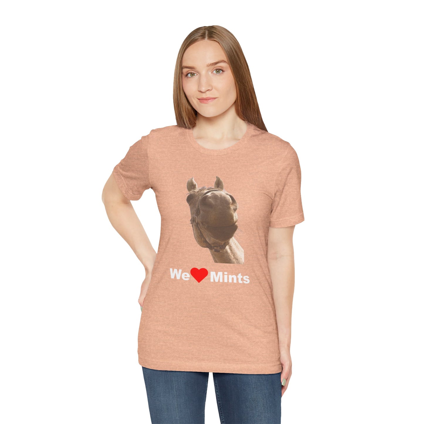 Peach short-sleeve t-shirt featuring a graphic of a horse's face above the text 'We Love Mints'.