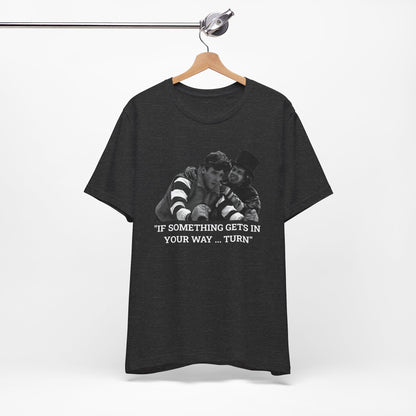 A heather gray short-sleeve t-shirt with a graphic from Better Off Dead.