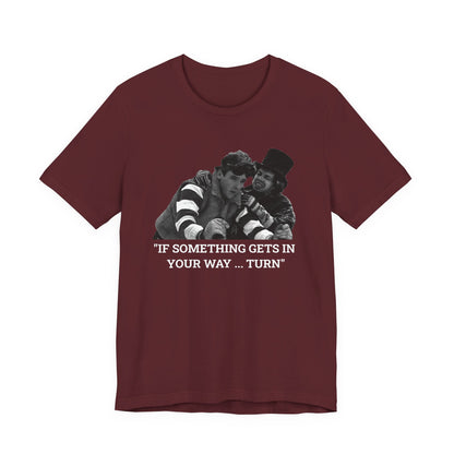 A maroon short-sleeve t-shirt with a graphic from Better Off Dead.
