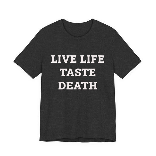 A heather gray crewneck t-shirt with Live Life Taste Death in white letters. Quote from movie Ski Patrol.