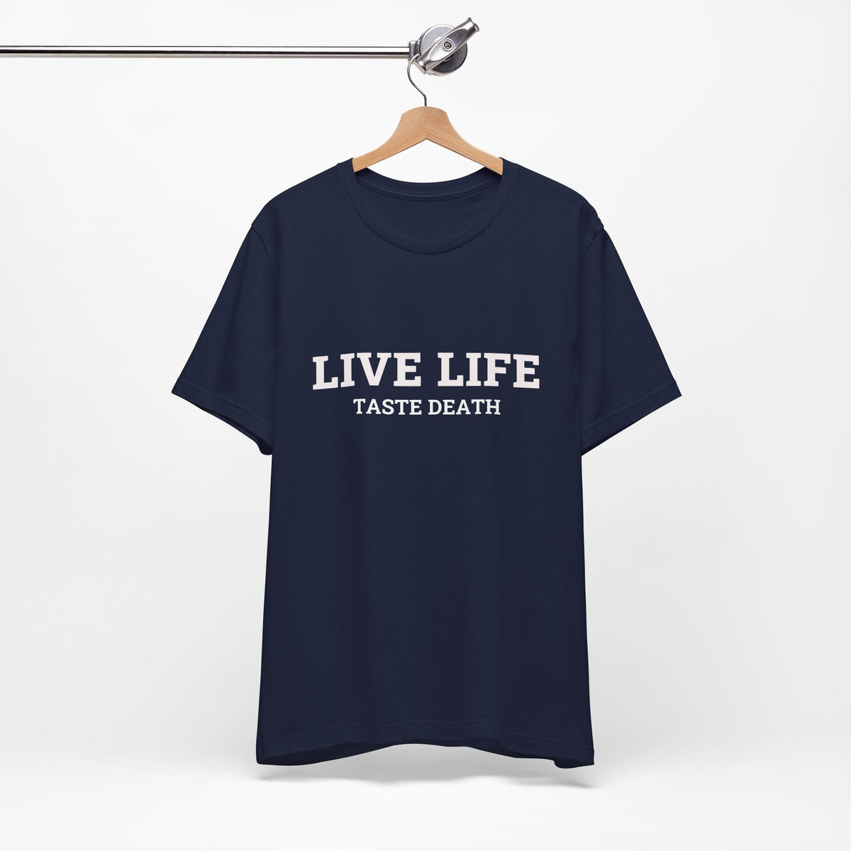Navy blue t-shirt with text quoted from 1990 Movie Ski Patrol, "Live Life Taste Death" in white.