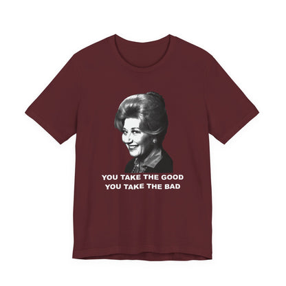 A maroon short-sleeve t-shirt featuring a black-and-white graphic of Mrs. Garrett from Facts of Life tv show with the text 'YOU TAKE THE GOOD YOU TAKE THE BAD' underneath.