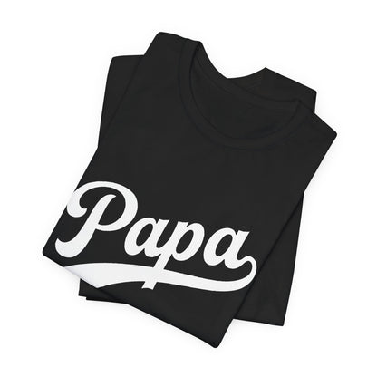 Folded black t-shirt with a graphic of Papa in white.