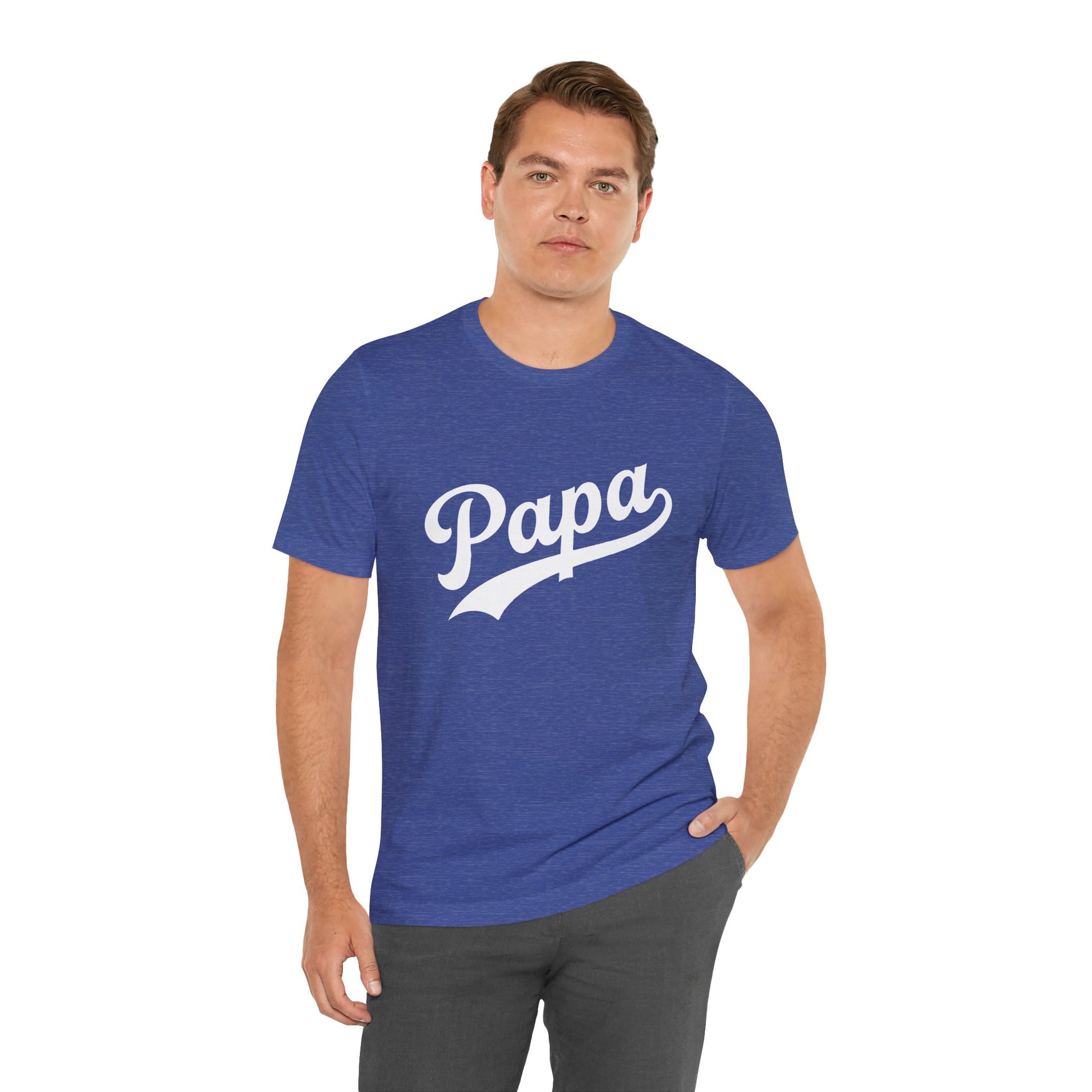 A man wearing a heather royal blue crewneck t-shirt with 'Papa' printed in white script across the chest.