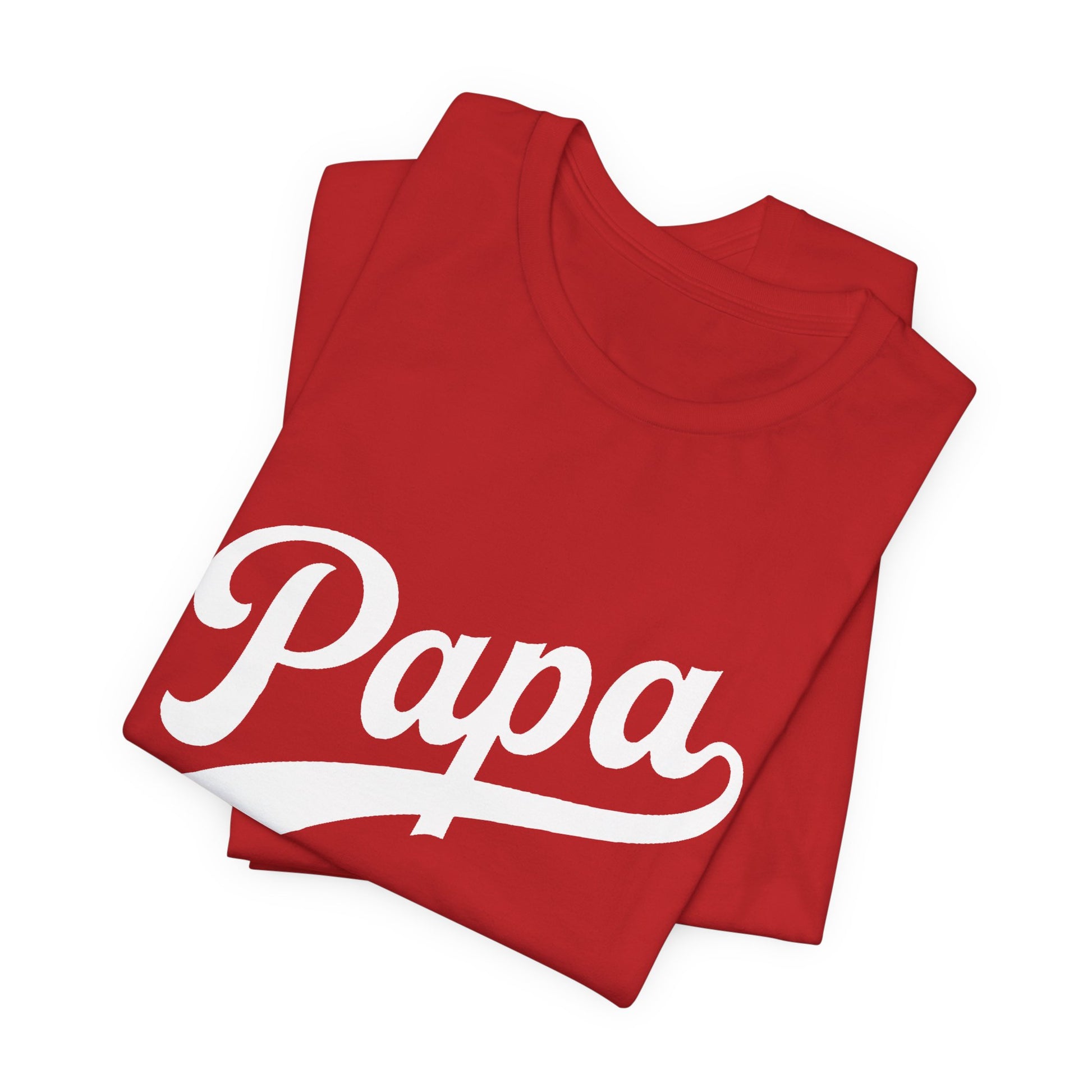 A folded red t-shirt with the word 'Papa' printed across the front.