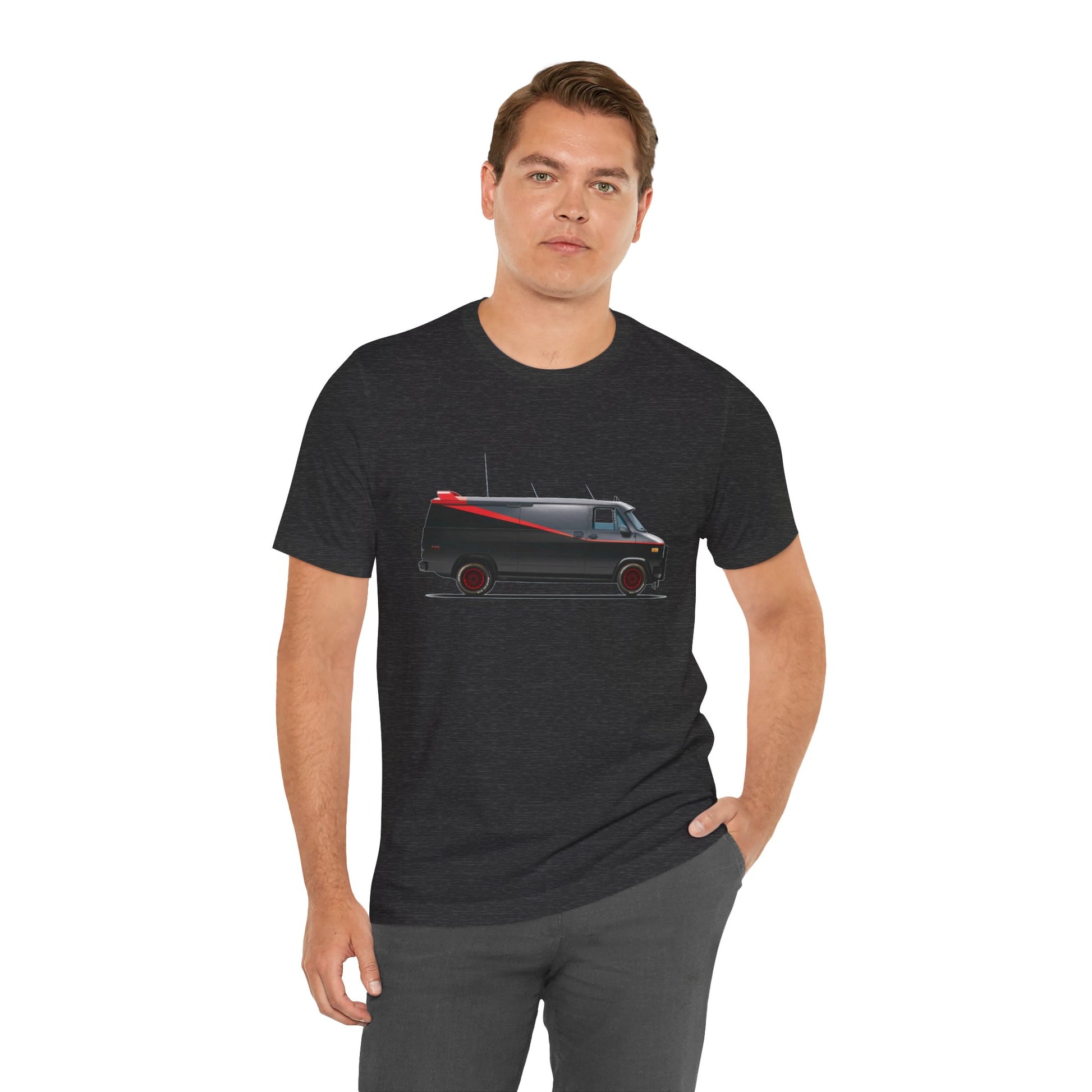 A man wearing a heather gray t-shirt with a graphic print of the adventure team van.