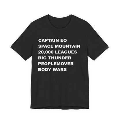A black short-sleeve crewneck t-shirt with bold white text on the front listing old retro disney rides.