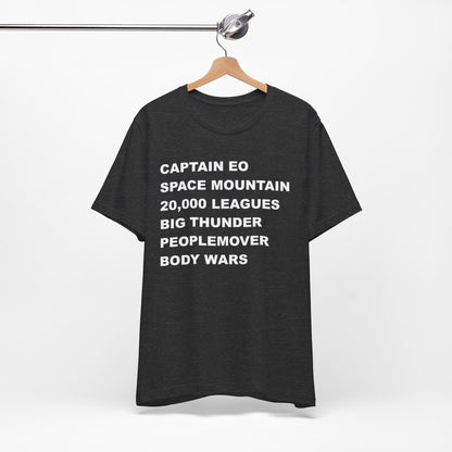 A heather gray short-sleeve crewneck t-shirt with bold white text on the front listing old retro disney rides.
