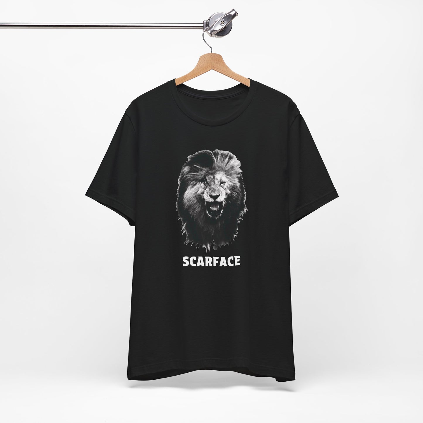 A black short-sleeve t-shirt featuring a graphic of a roaring lion's head with the word 'SCARFACE' printed in white below it.