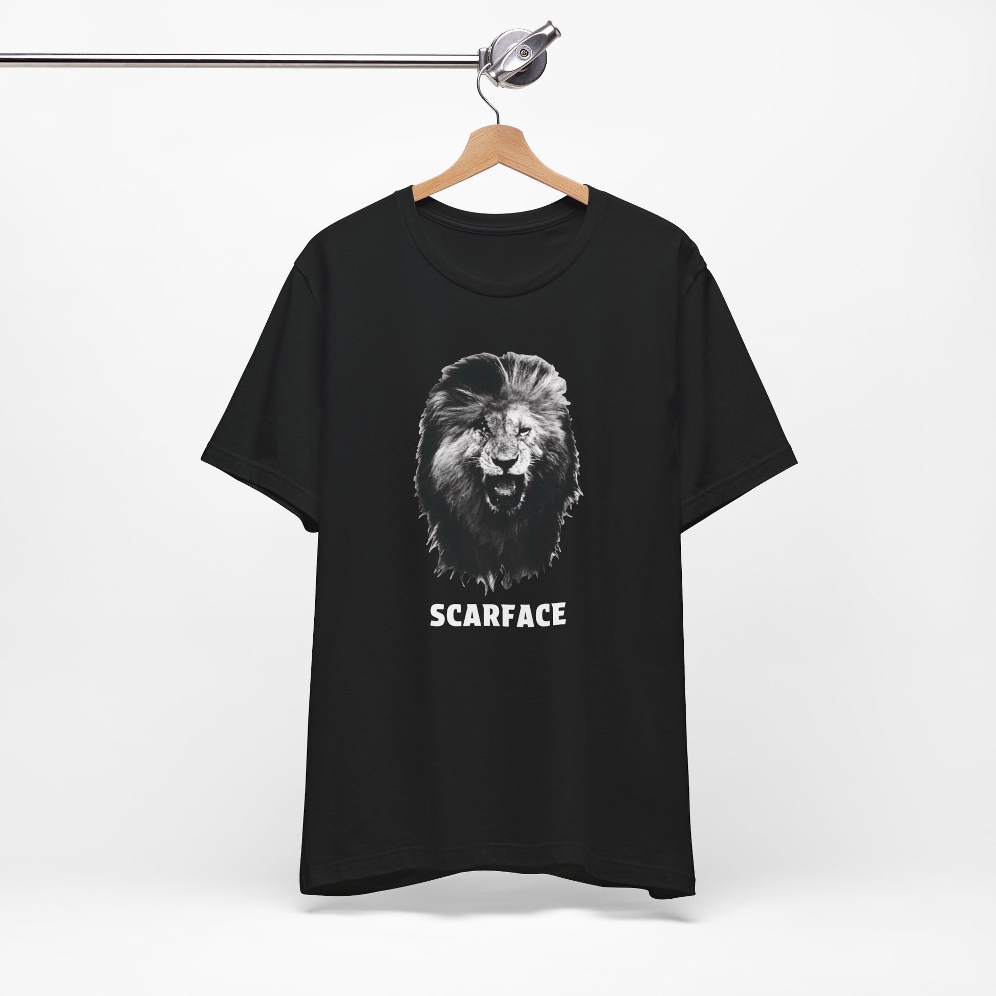 A black short-sleeve t-shirt featuring a graphic of a roaring lion's head with the word 'SCARFACE' printed in white below it.