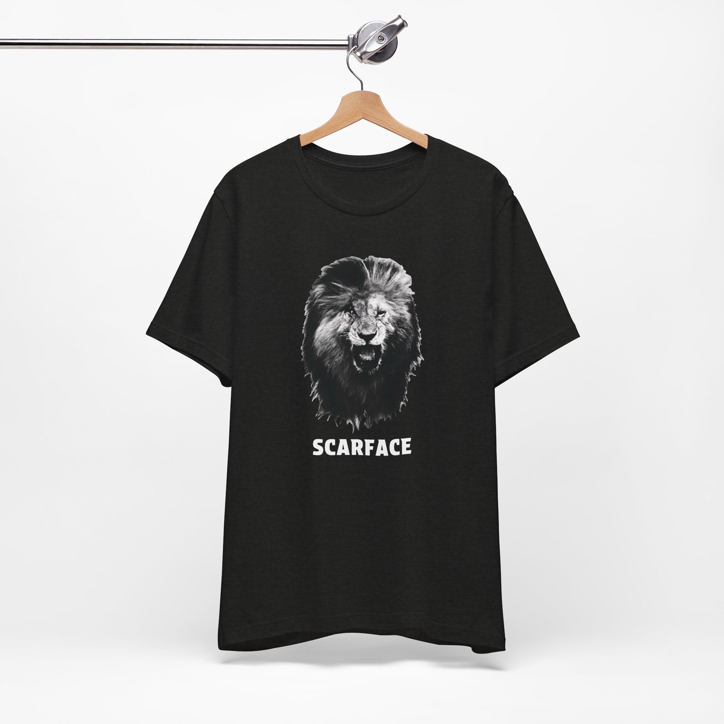 A black short-sleeve t-shirt featuring a graphic of a roaring lion's head with the word 'SCARFACE' printed in white below it.