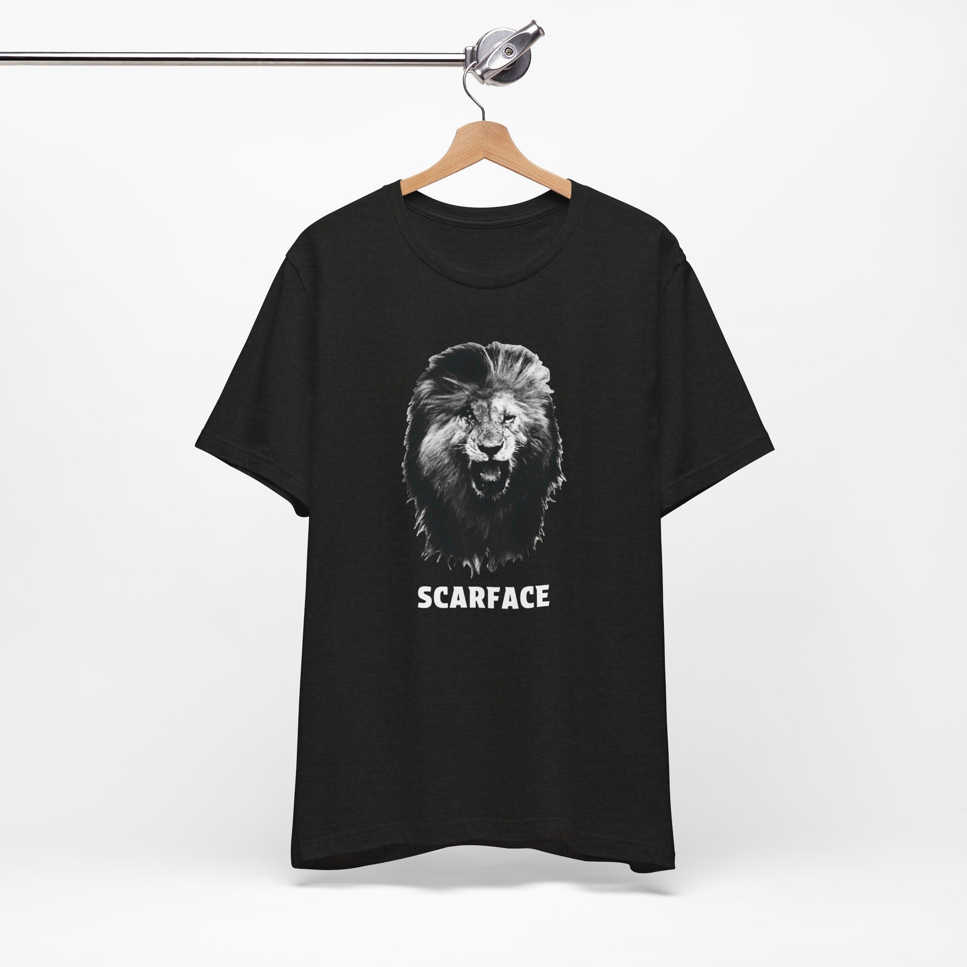 A black short-sleeve t-shirt featuring a graphic of a roaring lion's head with the word 'SCARFACE' printed in white below it.
