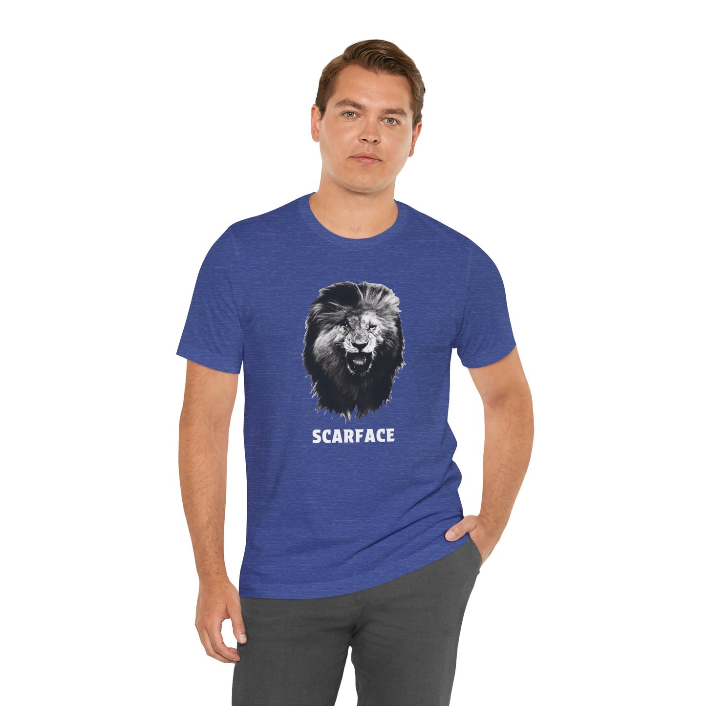 A heather blue short-sleeve t-shirt featuring a graphic of a roaring lion's head with the word 'SCARFACE' printed in white below it.
