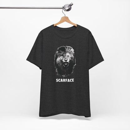 A heather black short-sleeve t-shirt featuring a graphic of a roaring lion's head with the word 'SCARFACE' printed in white below it.