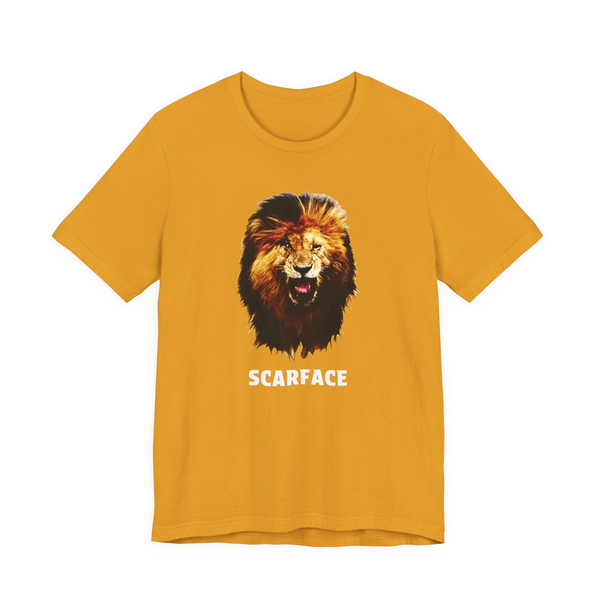 A mustard yellow short-sleeve t-shirt featuring a graphic of a roaring lion's head with the word 'SCARFACE' printed in white below it.