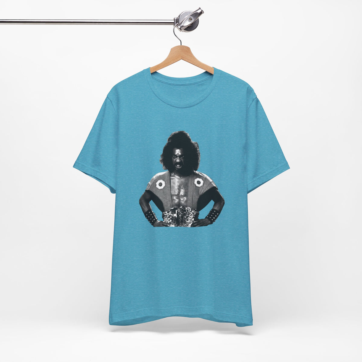 An aqua short-sleeve crewneck t-shirt featuring Shogun from the last Dragon.