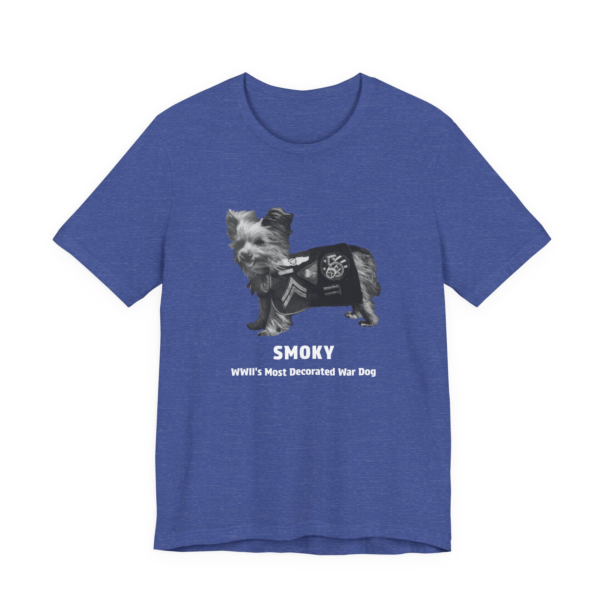 A heathered blue short-sleeve t-shirt with a graphic of a small dog wearing a black military-style jacket, with the text 'SMOKY' and 'WWII's Most Decorated War Dog' printed below.