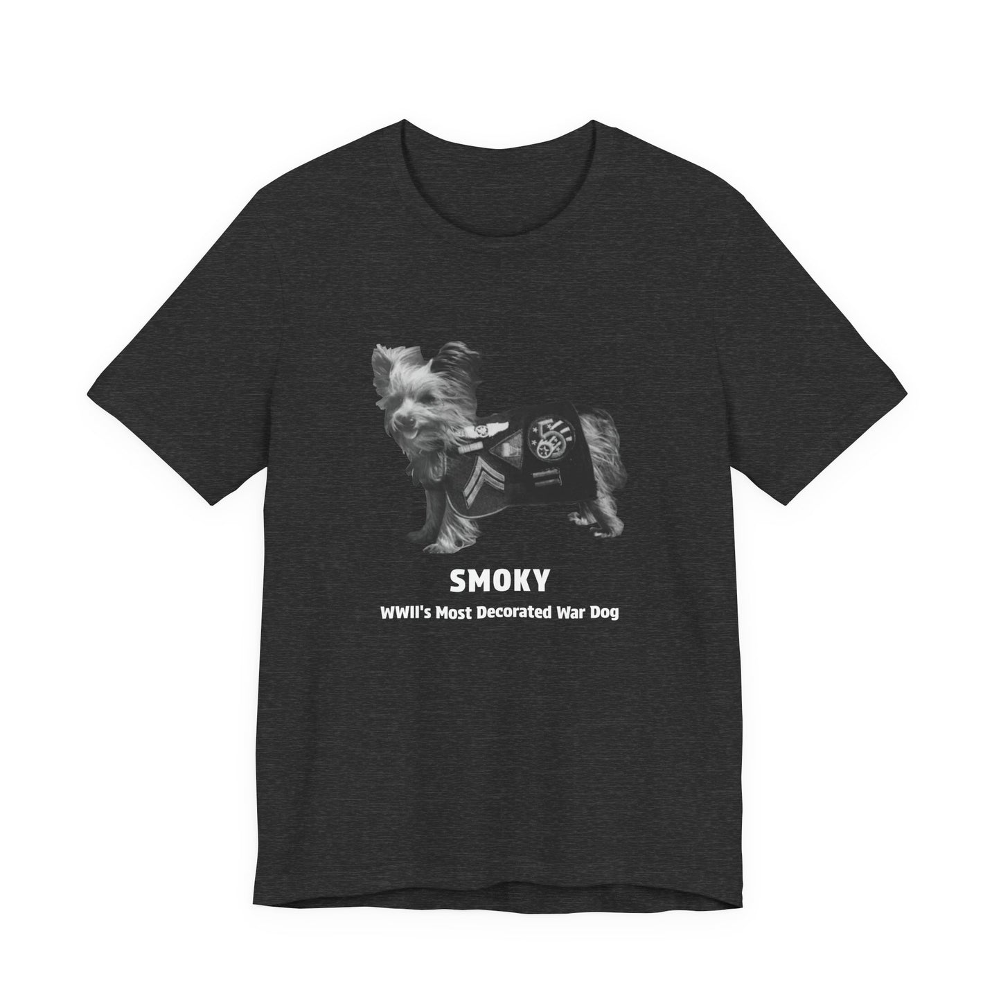 A heather gray short-sleeve t-shirt with a black and white graphic of a small dog wearing a military combat utility vest, with the text 'SMOKY' and 'WWII'S Most Decorated War Dog' printed below.