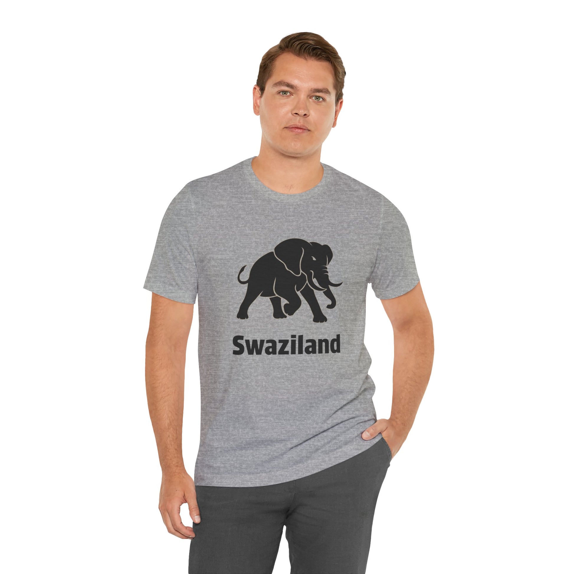 A man wearing a gray crewneck t-shirt with a black elephant graphic and the word 'Swaziland' printed below it.