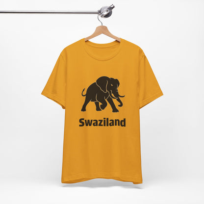 A mustard yellow t-shirt featuring a black elephant graphic and the word 'Swaziland' printed on the front.