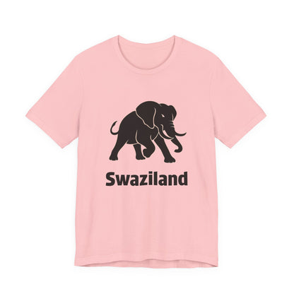 A peach short-sleeve crewneck t-shirt featuring a black graphic of an elephant and the word 'Swaziland' printed below it.