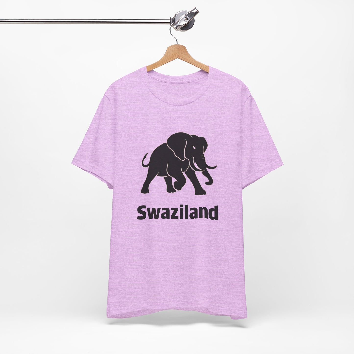 A pink t-shirt featuring a black elephant graphic and the word 'Swaziland' printed on the front.