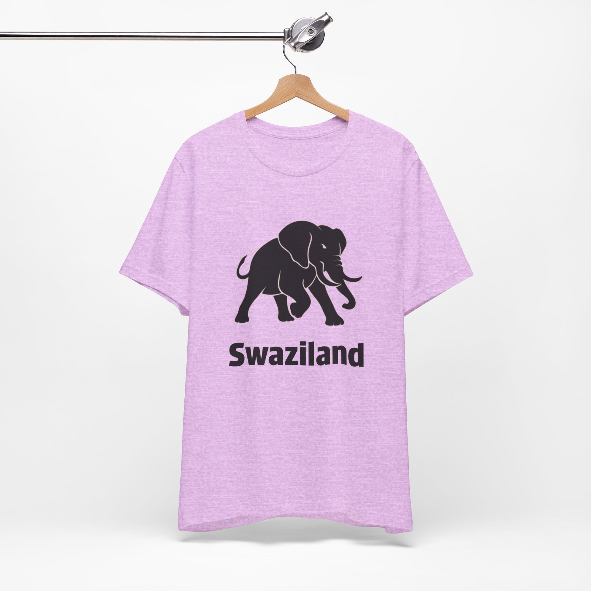 A pink t-shirt featuring a black elephant graphic and the word 'Swaziland' printed on the front.