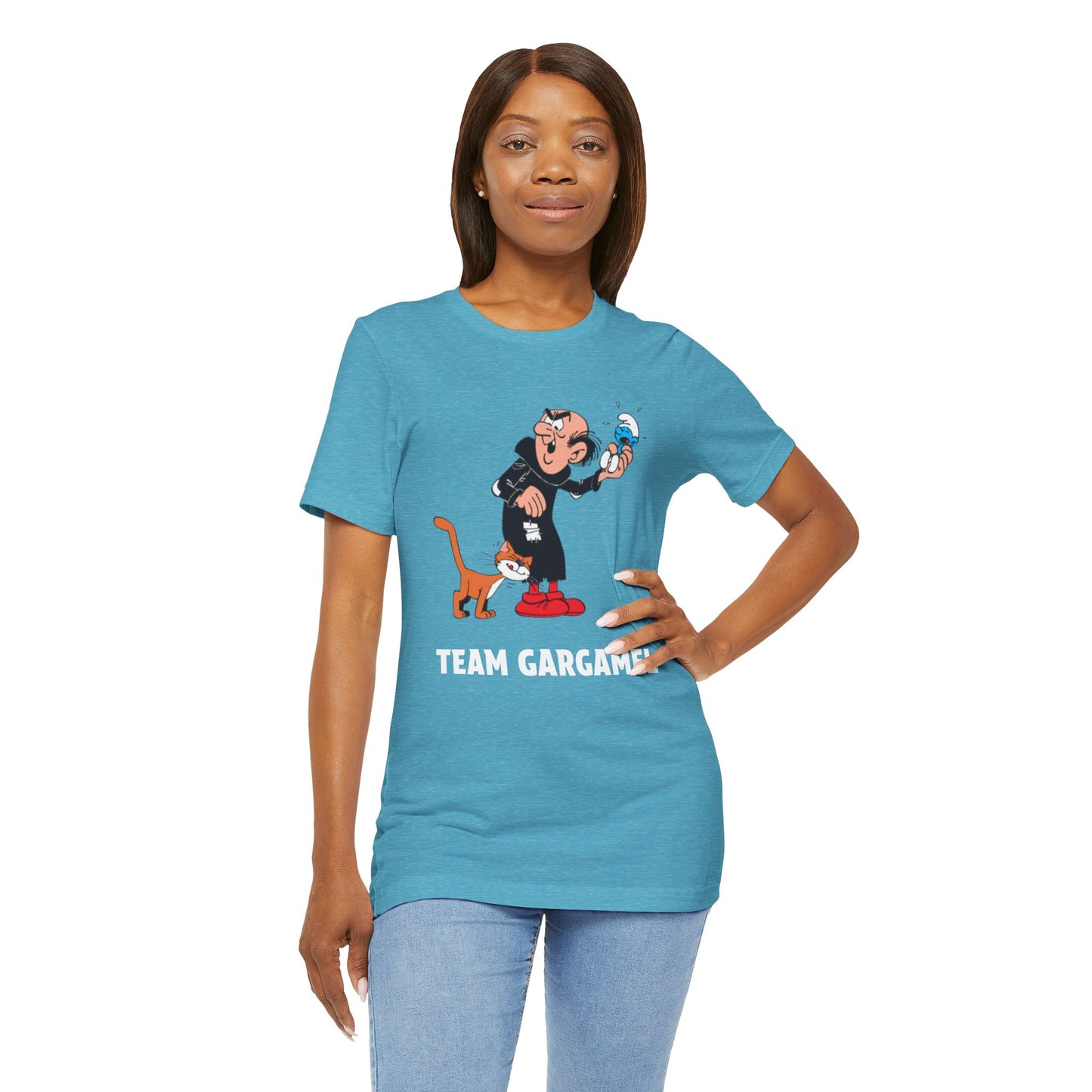 A woman modeling a heathered aqua short-sleeve t-shirt with a cartoon graphic and the text 'TEAM GARGAMEL' in white.