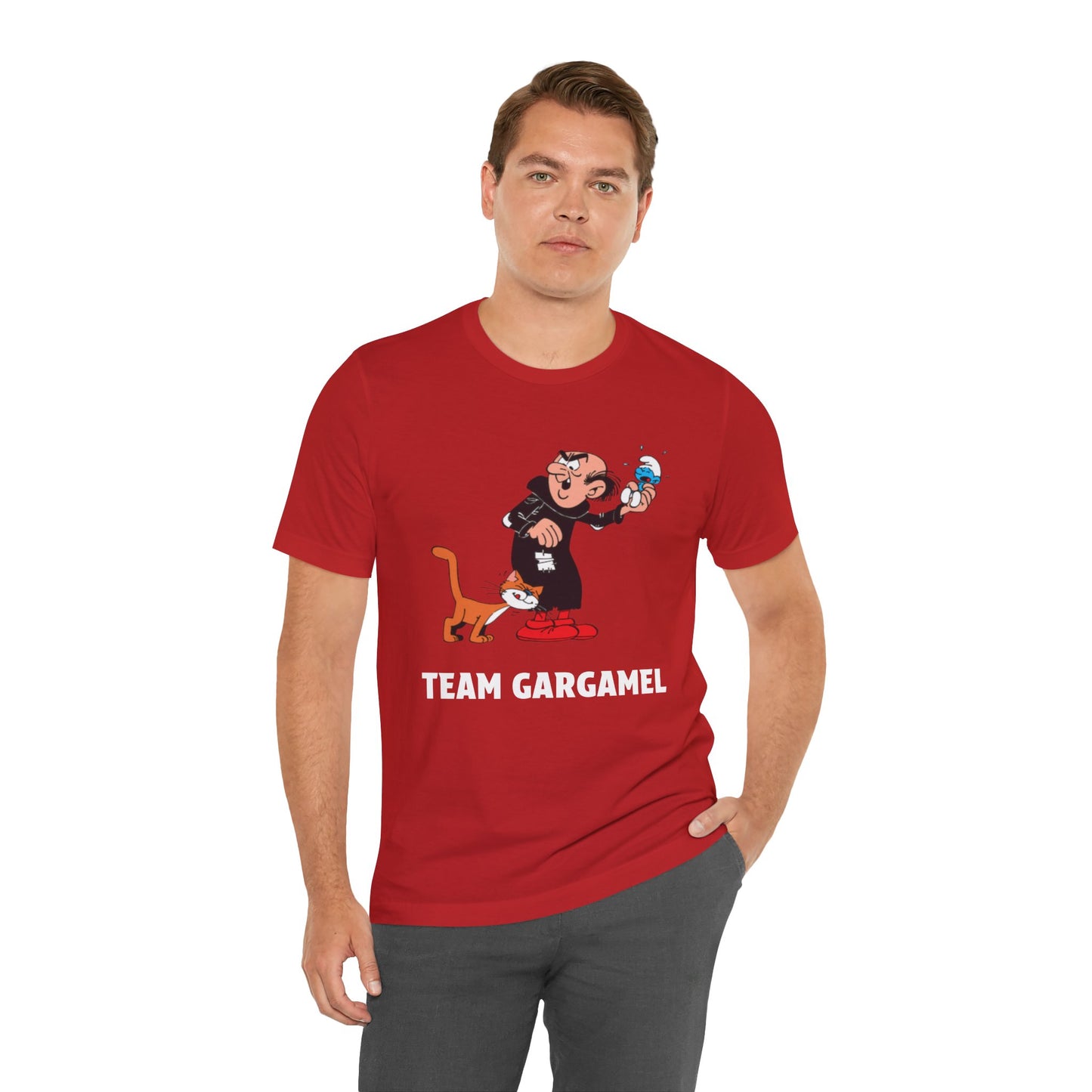 A man wearing a red crewneck t-shirt with a cartoon graphic with the text 'TEAM GARGAMEL' printed below it.
