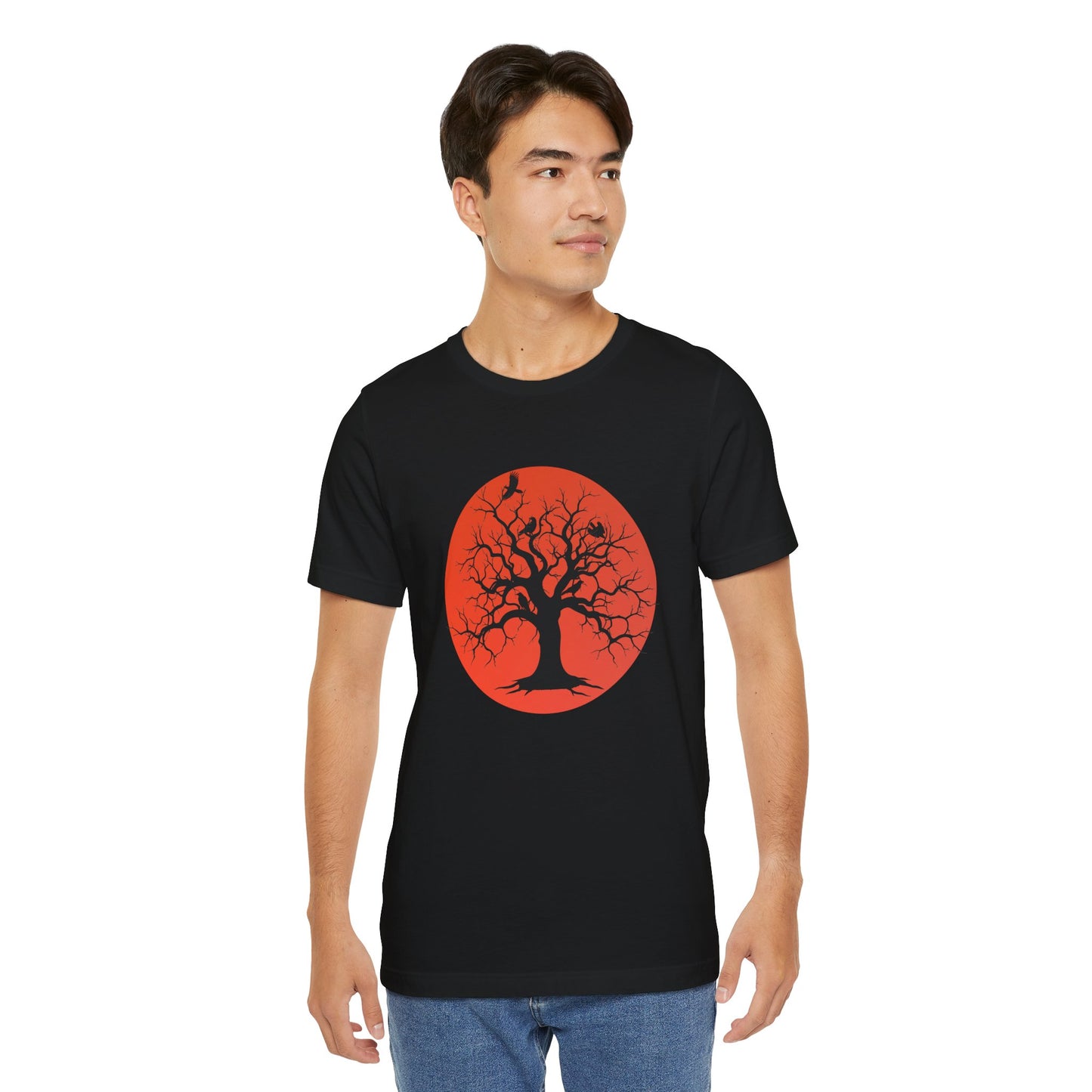 A black short-sleeve crewneck t-shirt featuring a graphic print of a black tree silhouette against a large blood moon with perched ravens.