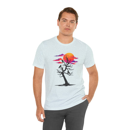 Tree of Ravens graphic tee featuring a black leafless tree with three ravens against a vibrant retro purple and orange sunset.